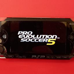 Sony PSP portable console Inc original Sony charger. 
also includes brand new battery.

Great for retro gaming or modding 

plus 2 boxed games
Pro Evolution Soccer 5
World Tour Soccer

collection only.
I don't post.