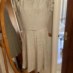 Mini dress 
Size 10
Black white pin stripes 
round neck
Cold shoulder style 
Slip on dress
Flare from waist
17” long from underarm 
From George
Collection or postage available