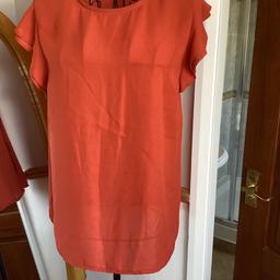 Summer lightweight top
Size 12
Burnt orange
Two frill cap sleeves 
Full button back
From atmosphere
Collection or postage available