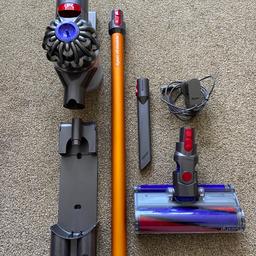 Dyson v8 cordless with charger and some attachments