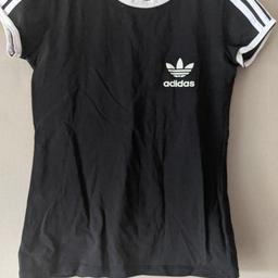 Black girls Adidas t shirt in excellent condition. Size small. Fitted my daughter from age 9.  Collection only please