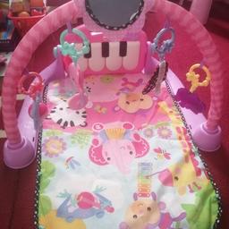 Used but good condition Fisher price baby gym. Comes complete with musical piano, hanging accessories (mirror, hippo, elephant, zebra and frog).