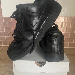 Black airforce 1 Nike trainers . Perfect for school , waterproof no rips or snags . Just normal creases from wearing . Look very smart for school . Genuine item Still have box , lots of wear in these shoes .