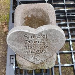I am selling these concrete garden ornaments which can also be used on a loved ones grave. There is a space for a small plant pot and on the front you can have a memorial plaque as seen in photos. These are not included in price as we don't make them to order. They came to us as job lot. I do have 3 plaques available only. They say:

Special Cousin miss you always
Special Niece miss you always
Special Uncle miss you always.

Message for complete price if you want one of the plaques with the plant holder. Otherwise price shown is plant holder only and I have 5 available.

Buyer to collect due to the weight.