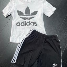 Age 3-4

Slight fading to adidas logo on T-shirt 

Overall good condition