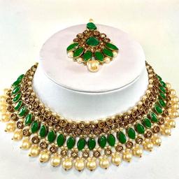 This beautiful 3 piece Choker Necklace, Earrings & Headpiece set is perfect for any Occasion. This amazing set is Gold Plated and filled with Bronze and Green Stonework. As the Jewellery is made from Zinc this is a durable material which will not discolour or corrode.
Care Instructions: Keep away from Water, Body Lotions and Perfumes
