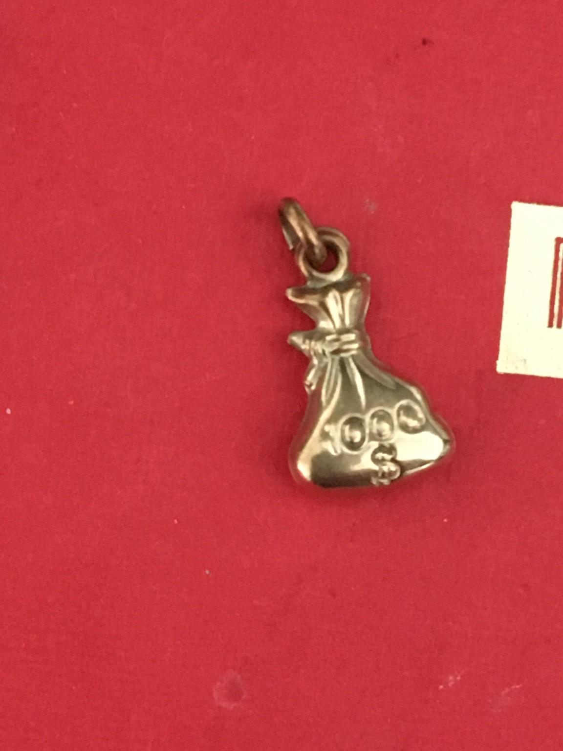 9ct gold charm money bag. in Epping Forest for £25.00 for sale | Shpock