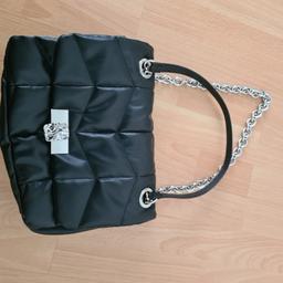 Black TopShop fashion handbag with separate compartments. Made from recycled material. In perfect condition.
