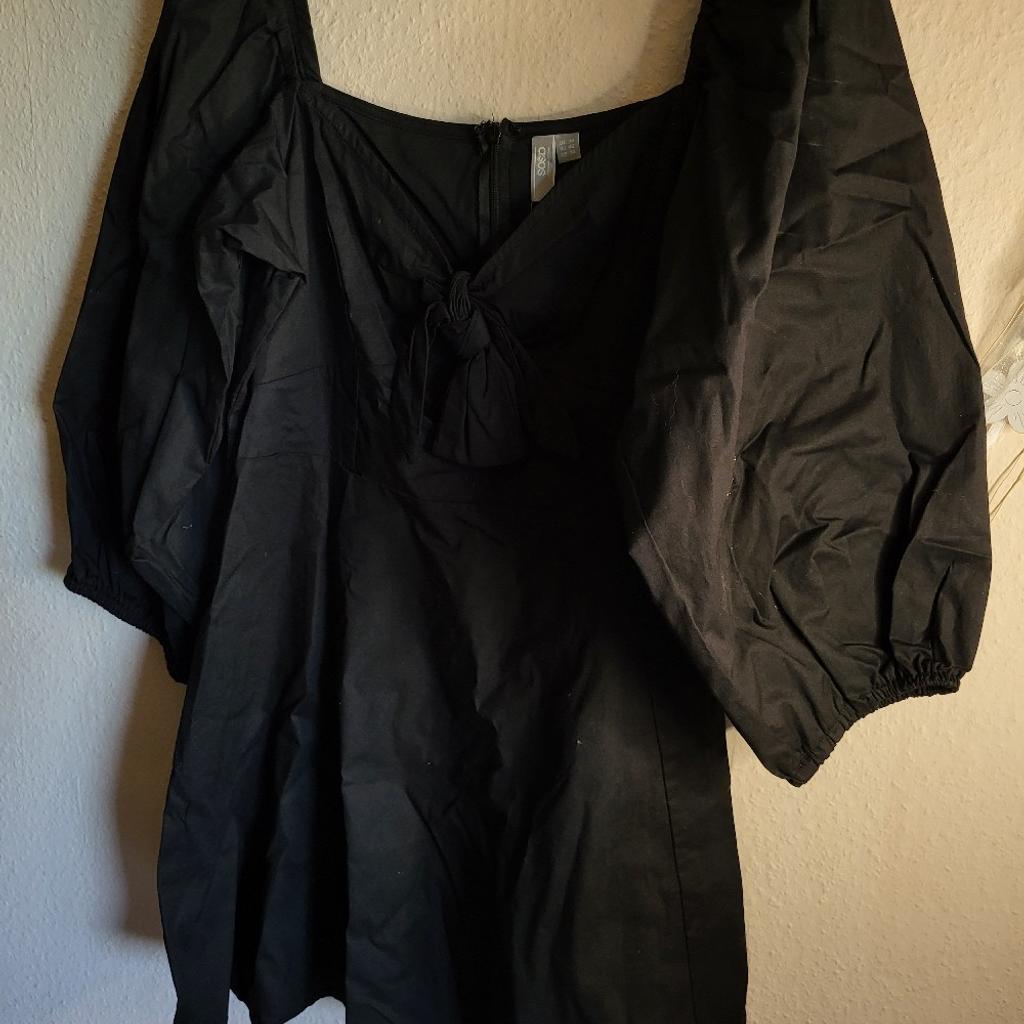 Super süßes kurzes schwarzes Kleid
Schleife vorne
Ballonärmel
A-Linie
hinten Reißverschluss
gr.L-XL