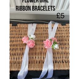 x2 flower girl ribbon bracelets 
White & Pink roses 
Used, for my own wedding 
Price £5 
Buyer to cover postage cost £5