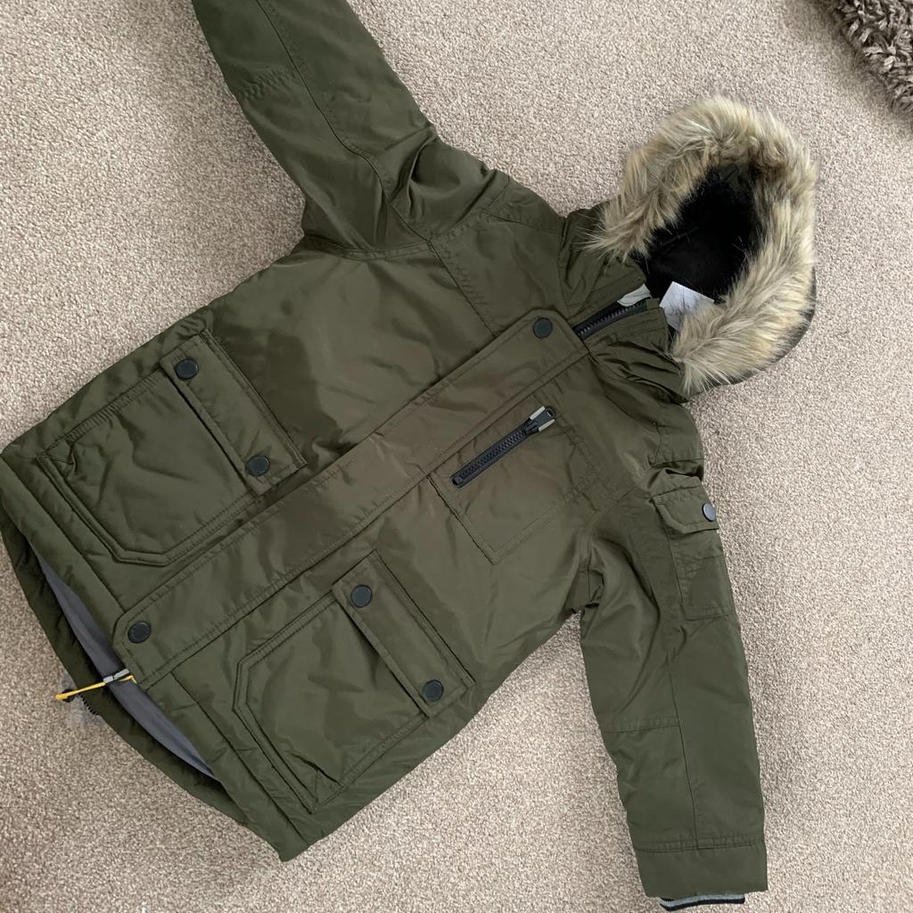 brand new with tags in packaging
New from Next
age 3 boys khaki green parka
winter coat jacket

CHECK OUT MY OTHER LISTINGS LOADS FOR SALE.