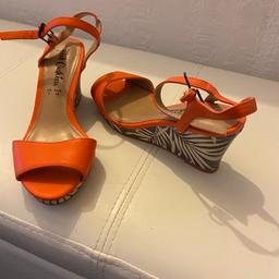 Ladies orange and multicolour wedge with ankle strap