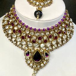 This Beautiful 3 piece Choker Necklace, Earrings & Headpiece set is perfect for any Occasion. This amazing set is Gold Plated and filled with Stonework. As the Jewellery is made from Zinc this is a durable material which will not discolour or corrode.
Care Instructions: Keep away from Water, Body Lotions and Perfumes