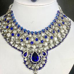 This Beautiful 3 piece Choker Necklace, Earrings & Headpiece set is perfect for any Occasion. This amazing set is Silver Plated and filled with Stonework. As the Jewellery is made from Silver this is a durable material which will not discolour or corrode.
Care Instructions: Keep away from Water, Body Lotions and Perfumes