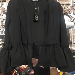 Beautiful short little going out jacket with ruffled sleeves and bottom brand-new looks lovely on Size 16
