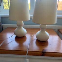 Two cream bedside tables. 
Good condition.