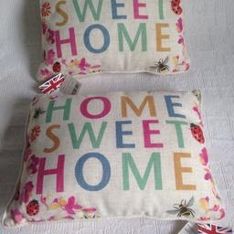 NEW two cushions and covers with zips home sweet home with butterflies and bees neutral colour on reverse NEW safety labels and tags may deliver