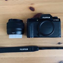 Fujifilm x-t200 with 15-45mm kit lens. This includes a battery, neck strap, screen protector, and the original box.

The camera is in excellent condition, with no scoffs or scratches. Selling as I don’t use it enough to justify keeping it.

Lens and camera can also be bought separately, see my page for separate listings.
