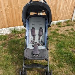 Really nice folding buggy stroller with raincover. EasyWalker brand. Sits up or reclines.