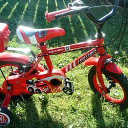 Apollo Fire Chief Kids Bike 12" wheel for young children, age range 3-5 years approximately around 98 cm and 112 cm tall. Has removable stabilisers. Also includes a little toy toolbox which is attached to the back. Has front and rear mudguards. Used, but in excellent condition and plenty of fun ride time left in this little bike. Collection only please.