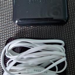 Samsung in ear headset eo-eg900bw.  Brand new. Never used. Can post but will incur postal charges.