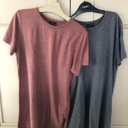 Boys T-shirts from Next
Age 11 years 
2 T-shirts, one blue marl and one pink marl fabric 
Soft jersey fabric
Long line T-shirts with a side zipper 
Worn but good condition
Pet and smoke free home