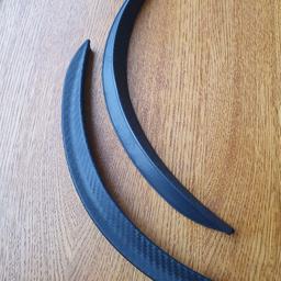car rear wheel arch protectors,brand new unwanted gift, carbon look ,cash and collection only from bakersgreen area, huyton, L367SZ