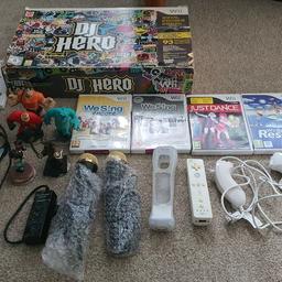 Nintendo wii games bundle and controller's. sing star games with 2 brand new mics. DJ hero deck brand new and game still sealed. Disney infinity game with 5 figures. controller and knumchucks and spare battery. few other games as well. selling as a joblot