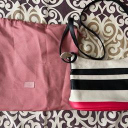 Radley London shoulder / cross body bag in great condition. 
Pink and off white colour.Two inner pockets No dust bag. 
Hardly used in excellent condition