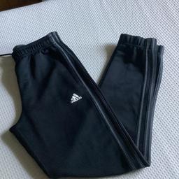 Black jogger bottoms with grey side stripes