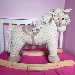 A beautiful Rocking horse that neighs and makes a galloping sound when it's ears are pressed. It has been used. £8. Collection only.