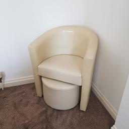 Leather Bucket chair with foot rest in good condition.