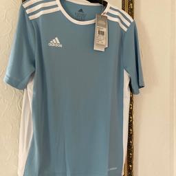 Bought from JD sports Age 11-12 yrs Blue/white Adidas Aeroready T Shirt. Paid £12 will accept £10