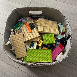 Box full of Lego, including 1 grey square Lego board.
Hardly used