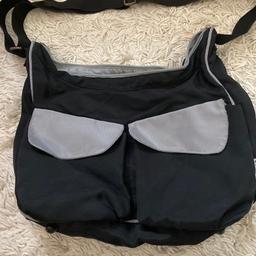 Black baby carry bag has two outside pockets inside the baby has a holder for a bottle and another zip compartment for smaller items, have also put in a changing mat this is not part of the bag just one I used to
Use myself