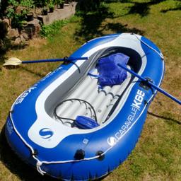 from  the partial annual upgrade of a Thames sports yacht.  used once. ok fit  for 2 adults max. Have fun on the canal. comes with 2 oars, a portable foot pump and carrier bag.  collection only Hackney E2. regards