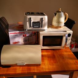 Cream 700 watt microwave, cream kettle, bread bin, and a cream 4 slice toaster, which still has just over 2 year warranty still left on it from argos paid nearly £40 for toaster and extra warranty. Which they will replace with a new one if toaster breaks. All working fine, just replacing as we had new kitchen fitted and doesn't go with deco . £50 the lot, collection Sudbury