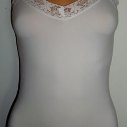 White Seamless Body Shaping Medium Control Camisole
So soft and comfortable – You will want to wear it under everything!
Matching sports bras, knickers and boyshorts are available. (Sold separately)
This cami features a beautiful lace trim along the V-neckline in the front. Problem areas involving soft skin around the tummy and hips are gently smoothed away.

Brand new with tags
Light support – No hooks or scratchy fastenings
Available in sizes UK: 8-10, 10-12, 12-14, 14-16
Available colours: Beige, Black, Pink, White, Turquoise Blue
Machine washable (30 degrees)

**I will be reporting scam emails to Shpock and National Fraud Line and the senders will be blocked immediately. I only communicate via Shpock mailing service and will not provide any personal details to scammers.**

CASH PAYMENT ON COLLECTION OR DELIVERY.