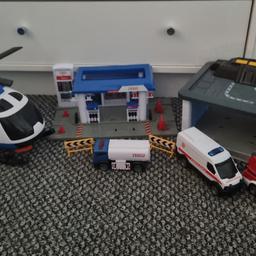 Comes with helicopter that makes sounds and lights up, petrol station and truck. And an ambulance and police car garage that lights and sounds with vehicles and working speaker. All in good  condition :)