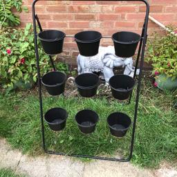 This has been used once in March then stored away,holds nine plants.collection only.has a little bit of rust which could be rubbed away I think..