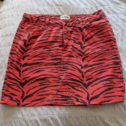 red animal print skirt, size 14, only worn a few times