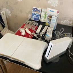 This is a Wii bundle with all you can see in the photos , all in good condition, also with manuals for both machine and balance board
