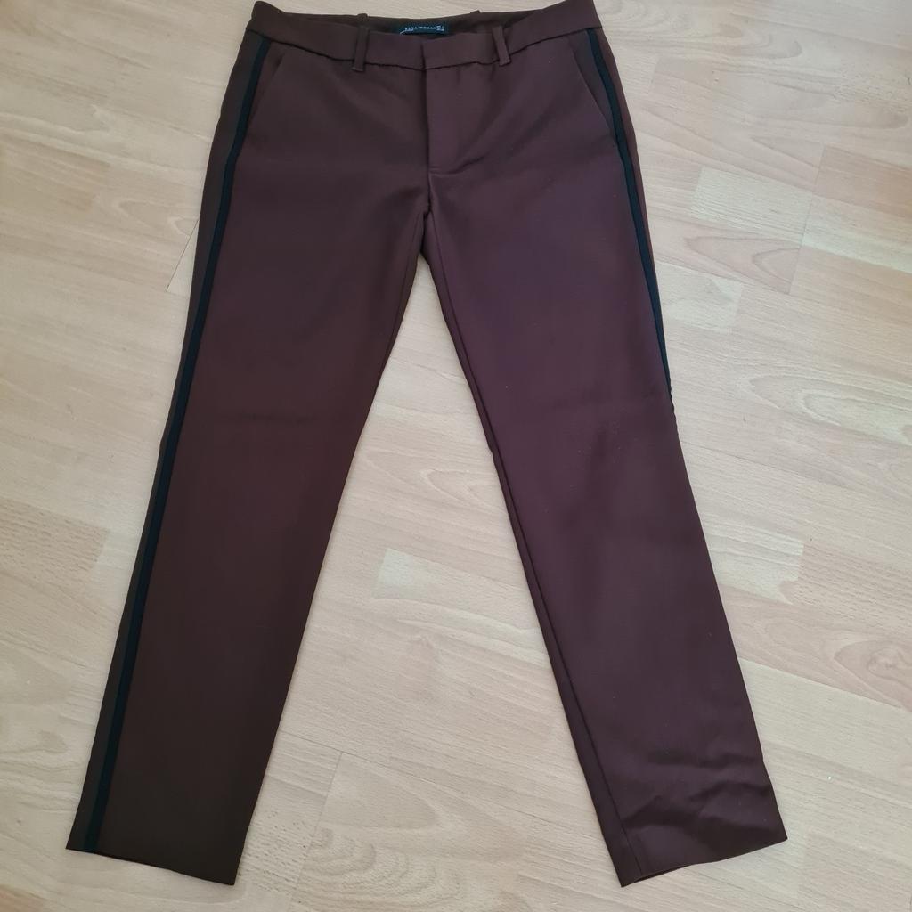 Burgundy pair of Zara Ladies Trousers With black side stripe design. Size: L.