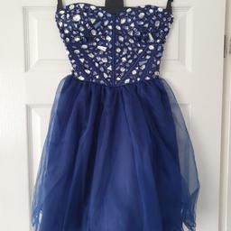 ladies dress
Quiz
midnight blue 
heavily jewelled bodice
net skirt
size 6
would easily fit up to size 10 as the bodice has an elasticated back and a full skirt
excellent condition 
worn once
Nice for party wedding occasion 
COLLECTION ONLY