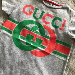 Gucci T-shirt age 8 yrs. Good condition and from pet and smoke free home. Labels removed as grandson found them irritating.