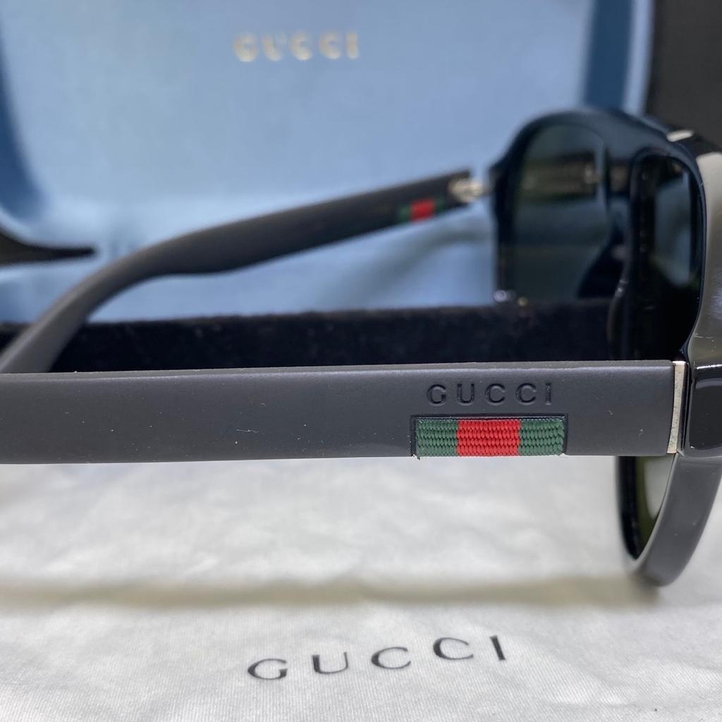 Mens black Gucci sunglasses like new no marks or stratches used a few times only. Original NOT fake.