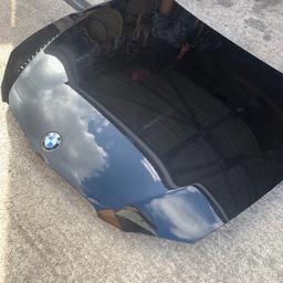 Bmw 5 series car bonnet in black came of 2010 couple on stone chips nothin major otherwise in good condition collection only due to size n weight fits E60 e61 