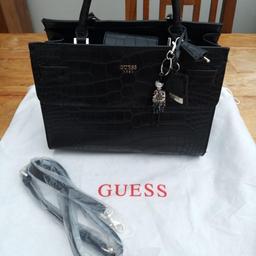Black Guess handbag
hardly used so in excellent condition
comes with dust bag and unused shoulder strap
would make an excellent gift
collection only please from Lea Preston
viewing welcome
