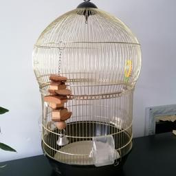 Budgie cage
Gold
Lovely cage,
 just one slight crack,
Doesn't interfere with the use of the cage at all.
Comes with food and water dishes
Comes with mirror and wooden toy with bell
54" Diameter.... 28" height
Buyer to collect or could deliver if local for small fuel fee