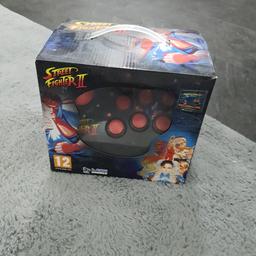 Street Fighter TV Plug In Arcade Game.

Battery Operated.

Selling on Amazon for £69.99